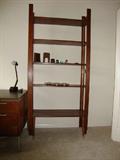 Tall wood bookshelf unit with adjustable shelves
