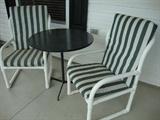 striped chairs and bistro table