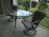 Round table, 2 swivel/rocker chairs