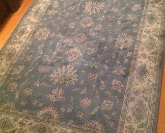 5x7 rug with colors of blue and beige