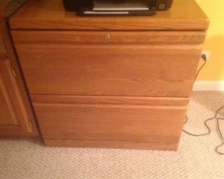 Wood filing cabinet...measures 31" wide x 21" deep x 30" tall