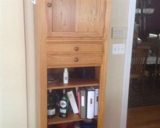 Matching tower cabinet in oak.  Measures 24" wide x 20" deep x 78" tall.  Presale at $125