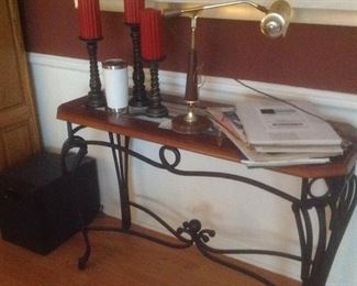 Beautiful sofa table ..wood and glass top with iron stand.  Measures  42" long x 16" deep x 28" tall