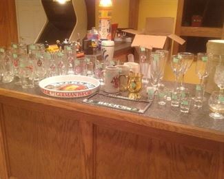 Variety of Becks glasses, mugs and trays