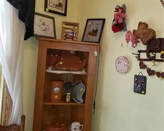 pair of hand painted corner cabinets, pottery, baskets, plates