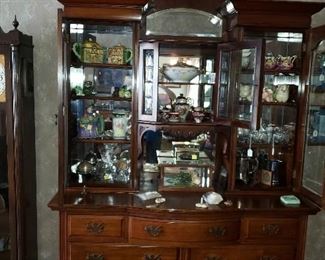Antique grandfather clock, Antique china cabinet on chest, glassware
