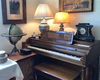 Waterbury clock, Rand McNally Globe, Baldwin Acrosonic upright piano, oriental lamps
