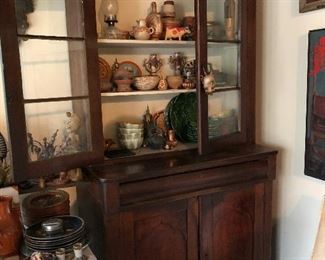 nice primitive 2pc hutch with glass front filled with pottery & folk art