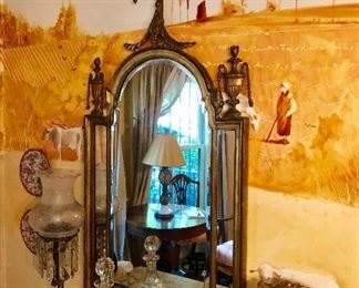 Antique Adams style gilt mirror featuring urns and pilasters