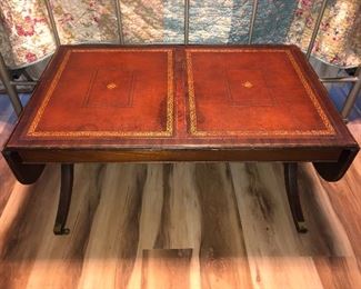  Henredon drop leaf coffee table with a leather top
