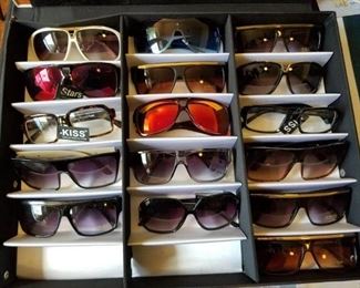 collection of glasses and sunglasses