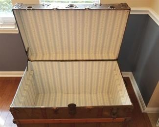 Steamer Trunk opened - lined with wallpaper