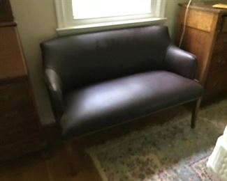 Leather love seat.