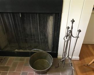 Brass fireplace accessories.