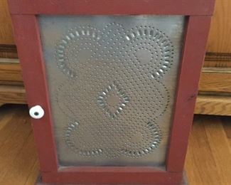 Pierced Metal Cabinet.