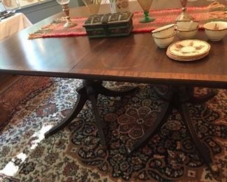 1800s table with leaf and chairs.