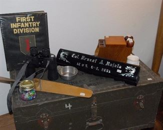 Several army footlockers/trunks