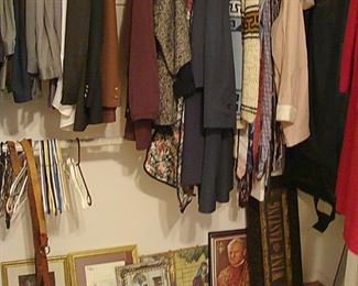 Closets full of womens and mens clothing 