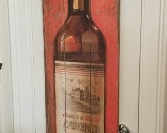 Very tall ( 5') wine bottle on wood planks