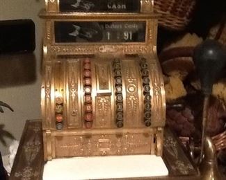 One of a kind !!!! Put in a Bar or cafe ❤️                   Great Conversation Piece       Works.     Marshall fields early 1900s Brass Cash Register. In Great condition - marble in good condition. Very heavy will deliver                        $2500.