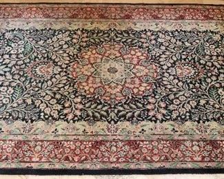 Handknotted silk rug