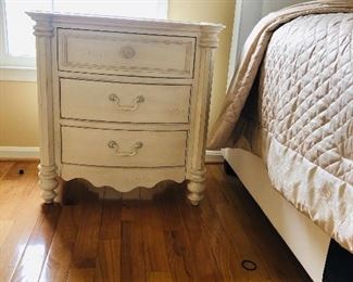 Two beautiful finely crafted bed side tables that are both attractive and practical with 3 deep roomy drawers.  Purchased at the Greenpoint Furniture store in Manassas.  Slightly distressed top.  Must see! 
