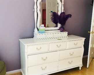 Well made wood dresser with 4 deep drawers and 3 medium size drawers, and a matching hutch that has two small drawers, and an ornate mirror ... would be beautiful in any young child's room! 