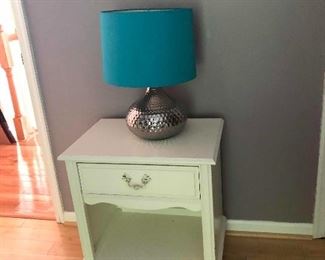 Bedside table is available with matching dresser that is sold separately.  Lamps sold separately (2) 
