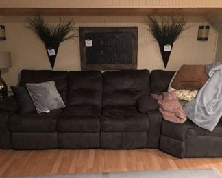 Sectional Couch in Charcoal Greyish Blue.  Only seeing part of couch.  Pictured is couch with 2 recliners and wedge.  Other part of section has 2 recliners and console as well.