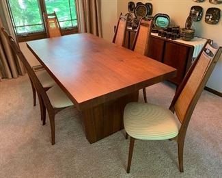 Vintage Mid Century Modern dining table by Dillingham and 6 cane back dining chairs attributed to Adrian Pearsall.  Table and chairs sold separately 