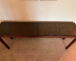 Incredible walnut console table with copper art detail.  57”W x 12”D x 24”T