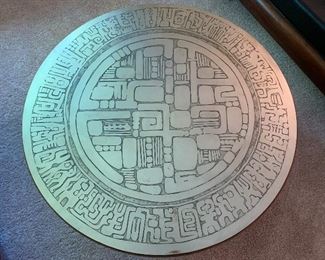 Very cool Mid Century Modern walnut coffee table with pressed silver top.  39 1/4” diameter