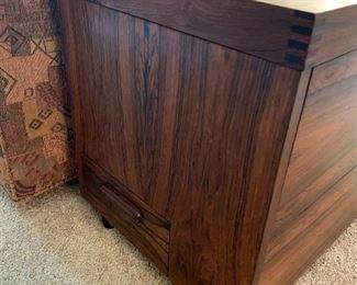 Amazing Rolf Hesland designed Haug Snekkeri for Bruksbo Danish Modern rosewood bar cabinet with barware and key