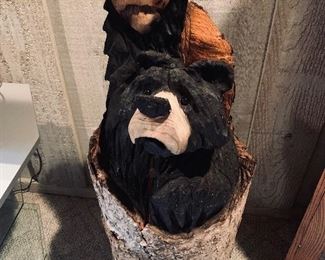 Buzz Brothers carved bear in a log