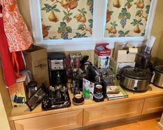 Nespresso, Cuisinart, Keurig coffee makers and other small electrics Including a Cuisinart food processor.  