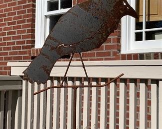 Wrought iron garden ornament of a crow