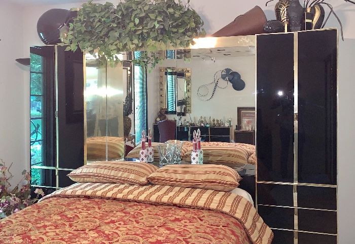 Full View of ELLO Queen Bedroom suite:  bed and mattress, bridge and 2 side dressers, mirrors in back.  Look up this manufacturer to see their prices and quality.