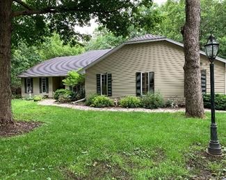 Walkway to the house- 4 BR, 2 1/2 tile Baths; Fireplace in Great Room and 4 seasons' Sun Room. Cathedral Ceiling, Large Mudroom/Laundry Room. Swin spa pool and hot tub-huge deck. 1 Acre, plus