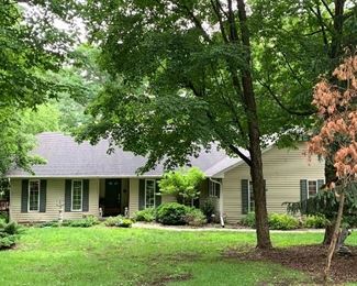Front of house for sale: 4 BR, 2 1/2 tile Baths; Fireplace in Great Room and 4 seasons' Sun Room. Cathedral Ceiling, Large Mudroom/Laundry Room. Swin spa pool and hot tub-huge deck. 1 Acre, plus