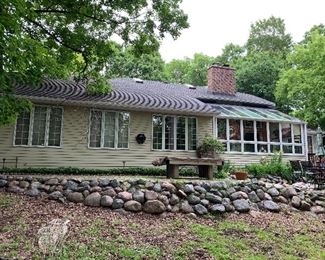 Back of house- 4 BR, 2 1/2 tile Baths; Fireplace in Great Room and 4 seasons' Sun Room. Cathedral Ceiling, Large Mudroom/Laundry Room. Swin spa pool and hot tub-huge deck. 1 Acre, plus
