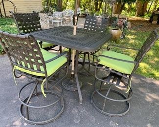 Like-New. Sturdy, heavy wrought iron, Bar- high table, umbrella, and stand, cushions and 4 chairs-