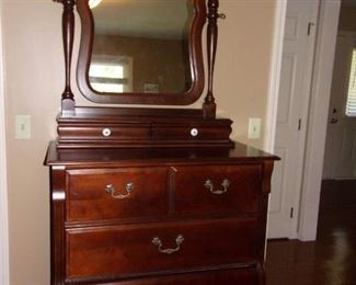 Pretty dresser with swivel mirror.