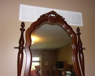 Pretty dresser with swivel mirror.