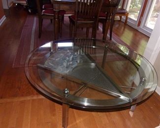 Brushed aluminum and metal glass top coffee table.