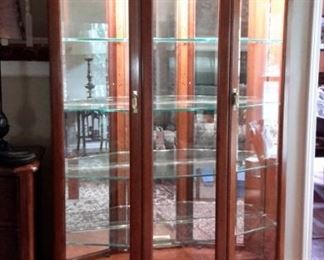 Large lighted glass front curio