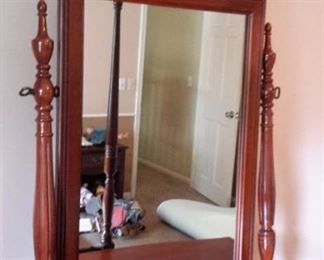 Pretty dresser with swivel mirror.