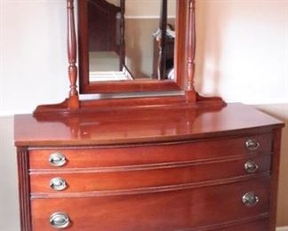 Pretty dresser with swivel mirror.