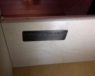 Young America furniture is proudly Made in the U.S.A. by acclaimed furniture maker Stanley Furniture. Stunning pieces including wardrobe with mirror and two drawers, night stand,  and full size bed headboard and footboard.....beautiful beaded accent.