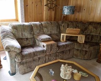 Sectional sofa with recliner on left end