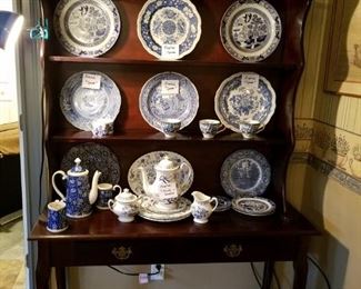 Great china cabinet display with Blue Willow, Spode plates, Blue White Tea pots